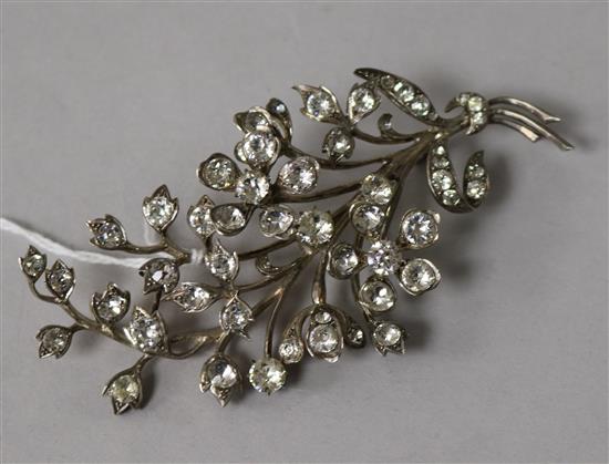 A continental 935 white metal and paste set floral spray brooch, 10cm.